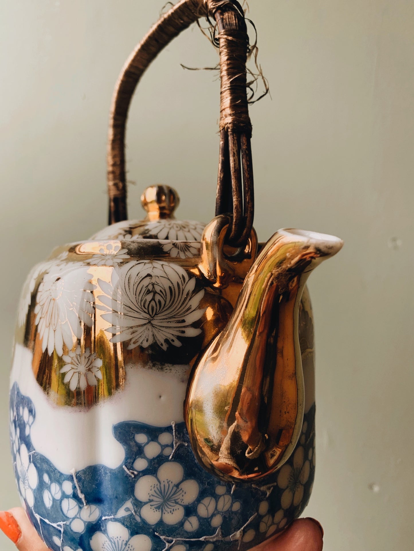 Antique Porcelain Floral Decorative Teapot with Wicker Handle
