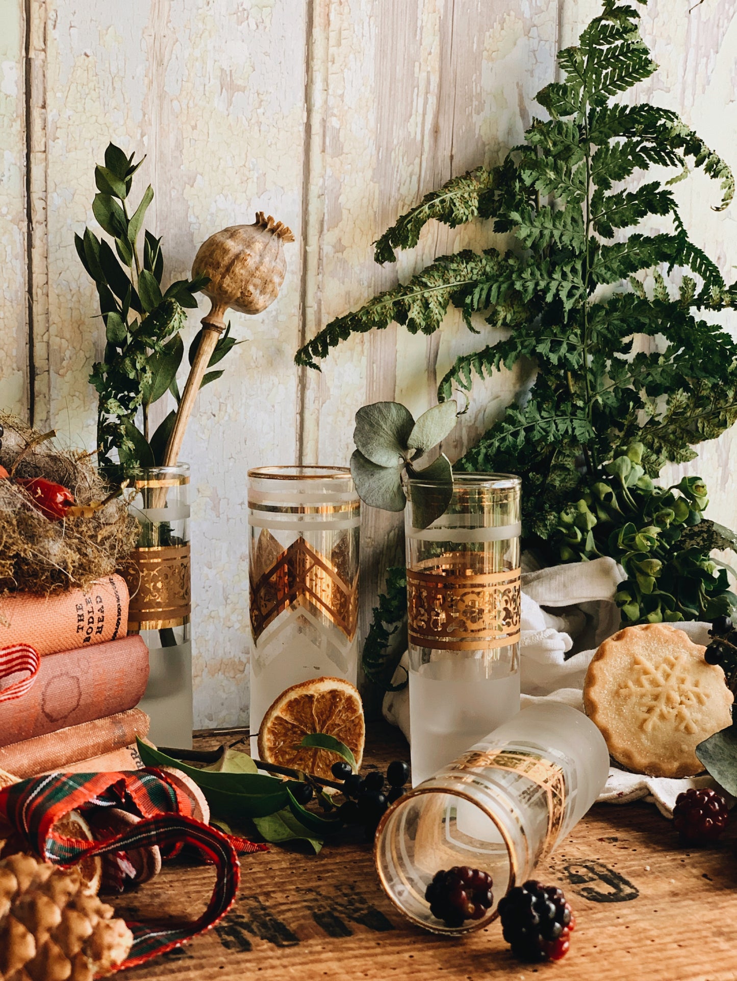 Four Gilt Decorative Shot Glasses