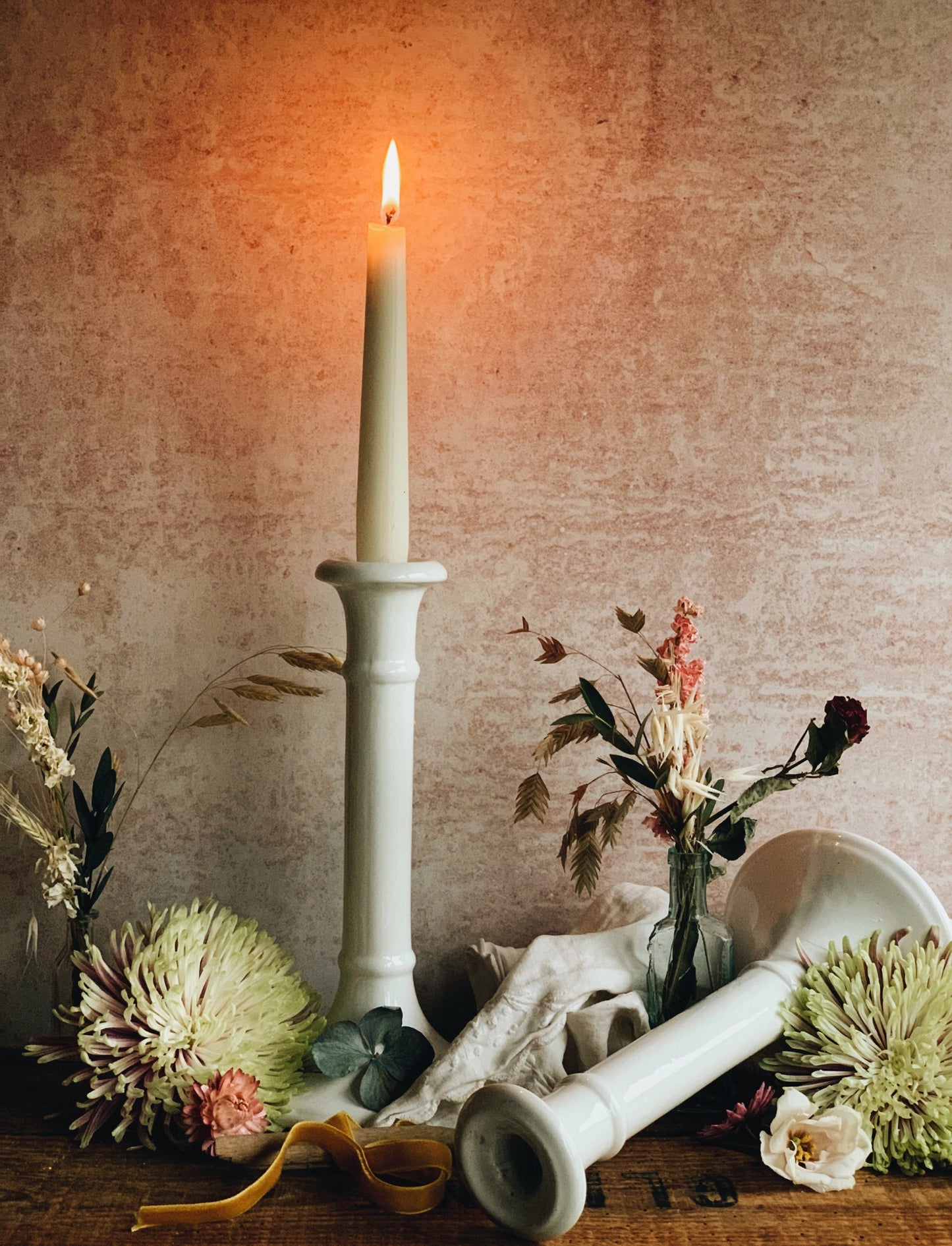 A Pair of Vintage White Ceramic Candle Sticks