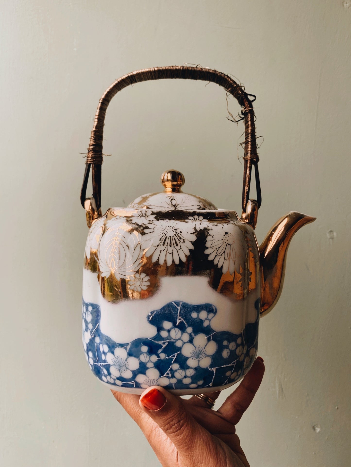 Antique Porcelain Floral Decorative Teapot with Wicker Handle
