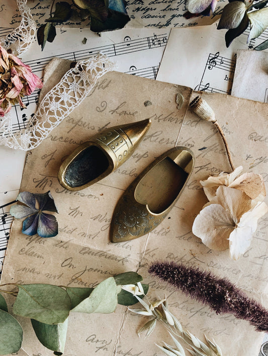 Two Vintage Brass Shoes
