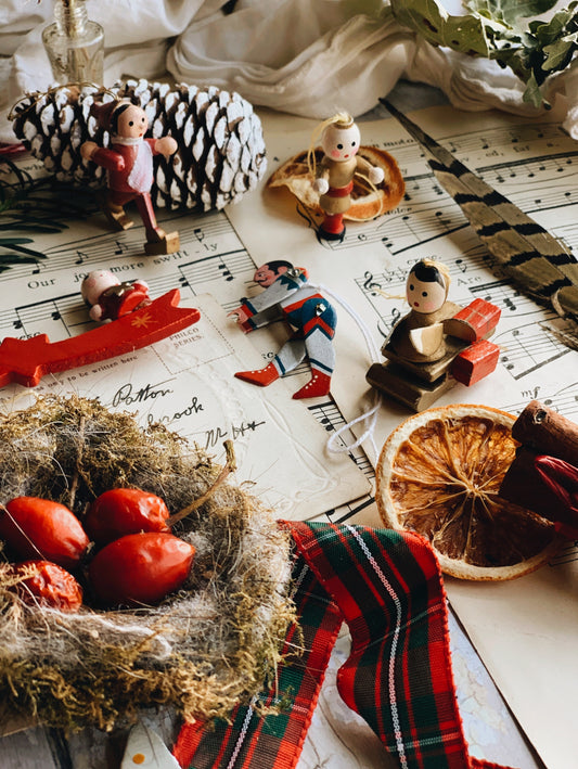 An Assortment of Six Wooden Vintage Christmas Decorations