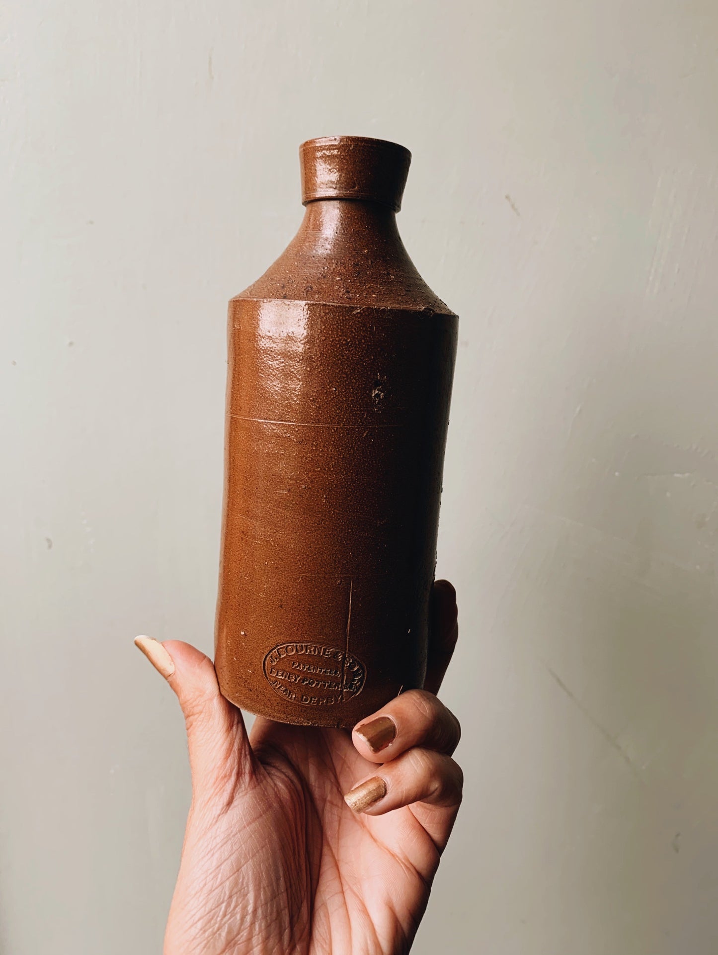 Antique Brown Stamped Stone Bottle