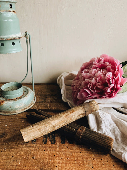 Two Antique Pegs