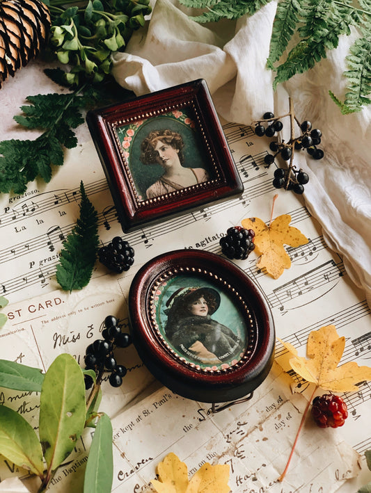 A Set of Vintage Wooden Frames with Images