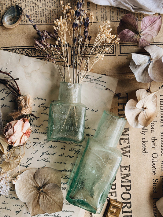 Two Early 1900’s Apothecary Bottles