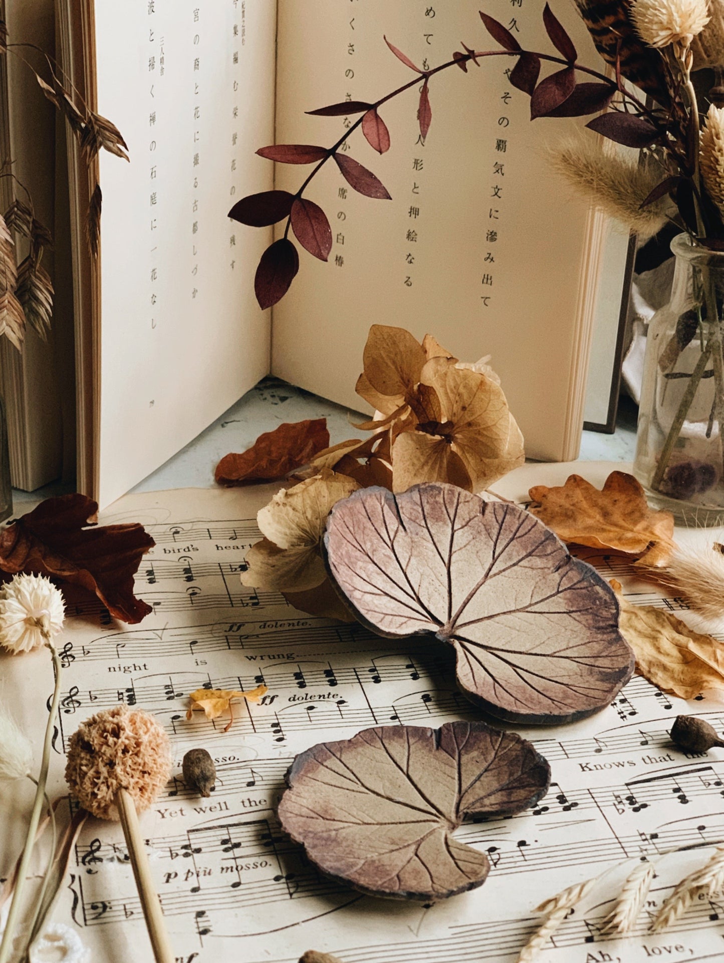 A Pair of Ceramic Leaf Print Dishes