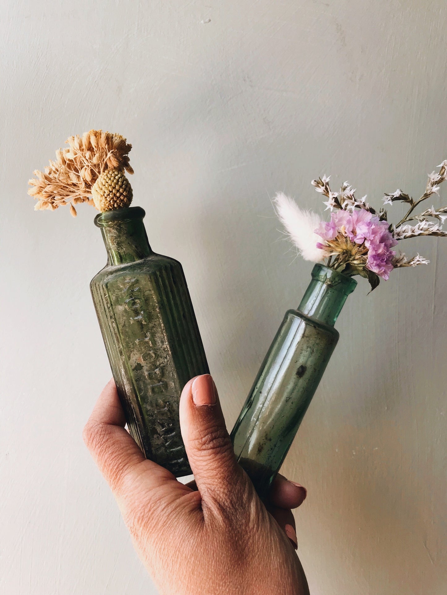 Two Antique Green Apothecary Bottles