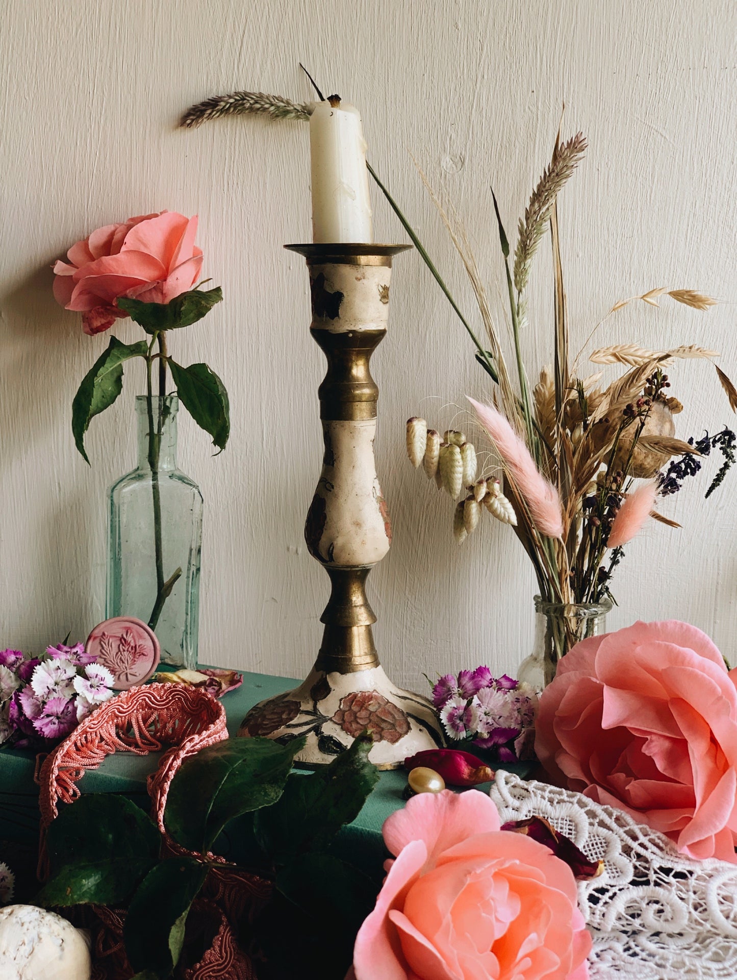 A Pair of Vintage Brass Enamel Floral Candle Sticks