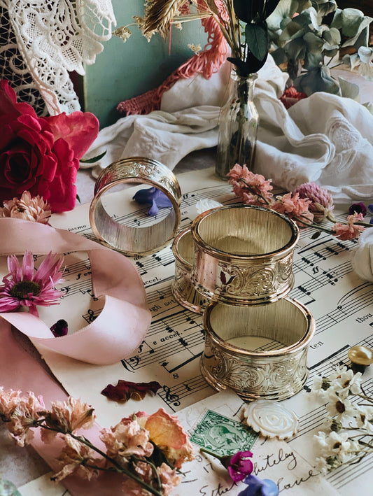 Four Silver Etched Floral Napkin Rings