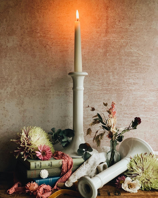 A Pair of Vintage White Ceramic Candle Sticks