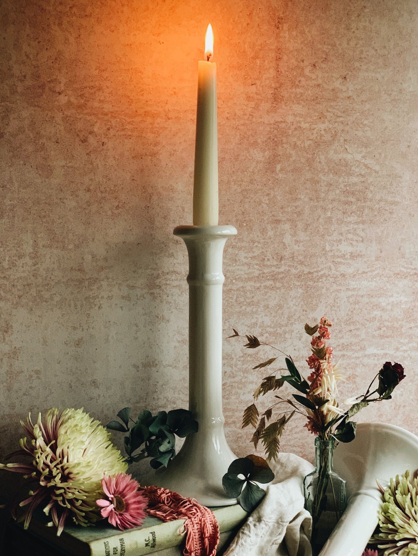 A Pair of Vintage White Ceramic Candle Sticks