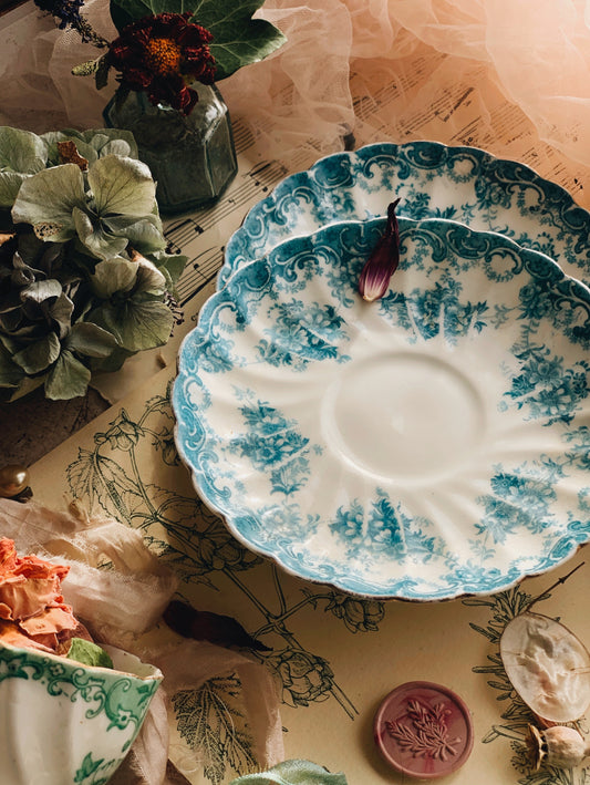 Two Antique Blue Teal Saucers