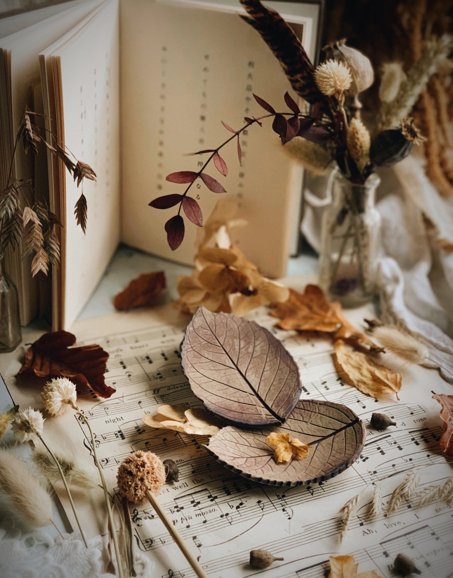 A Pair of Ceramic Leaf Print Dishes