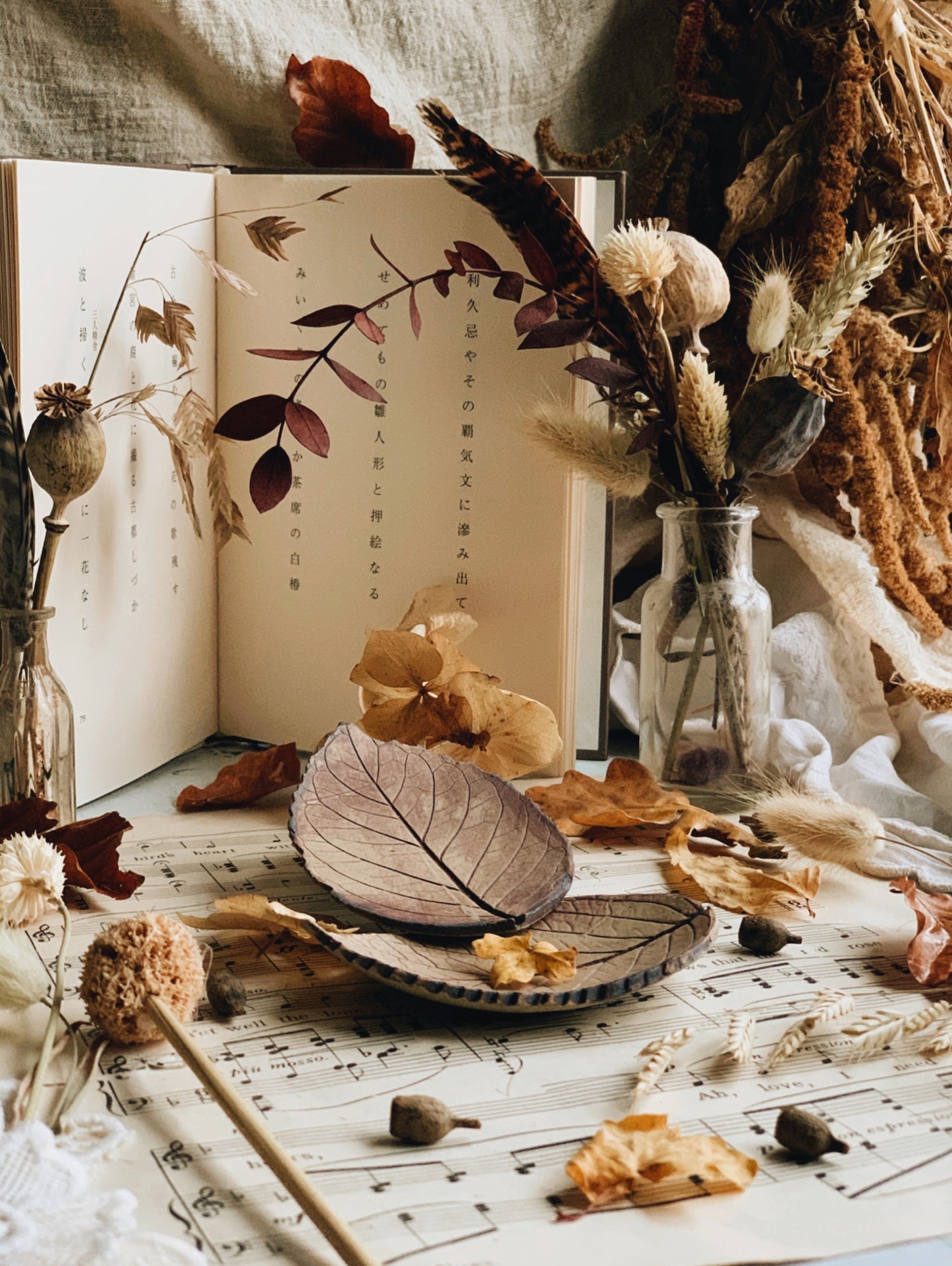 A Pair of Ceramic Leaf Print Dishes