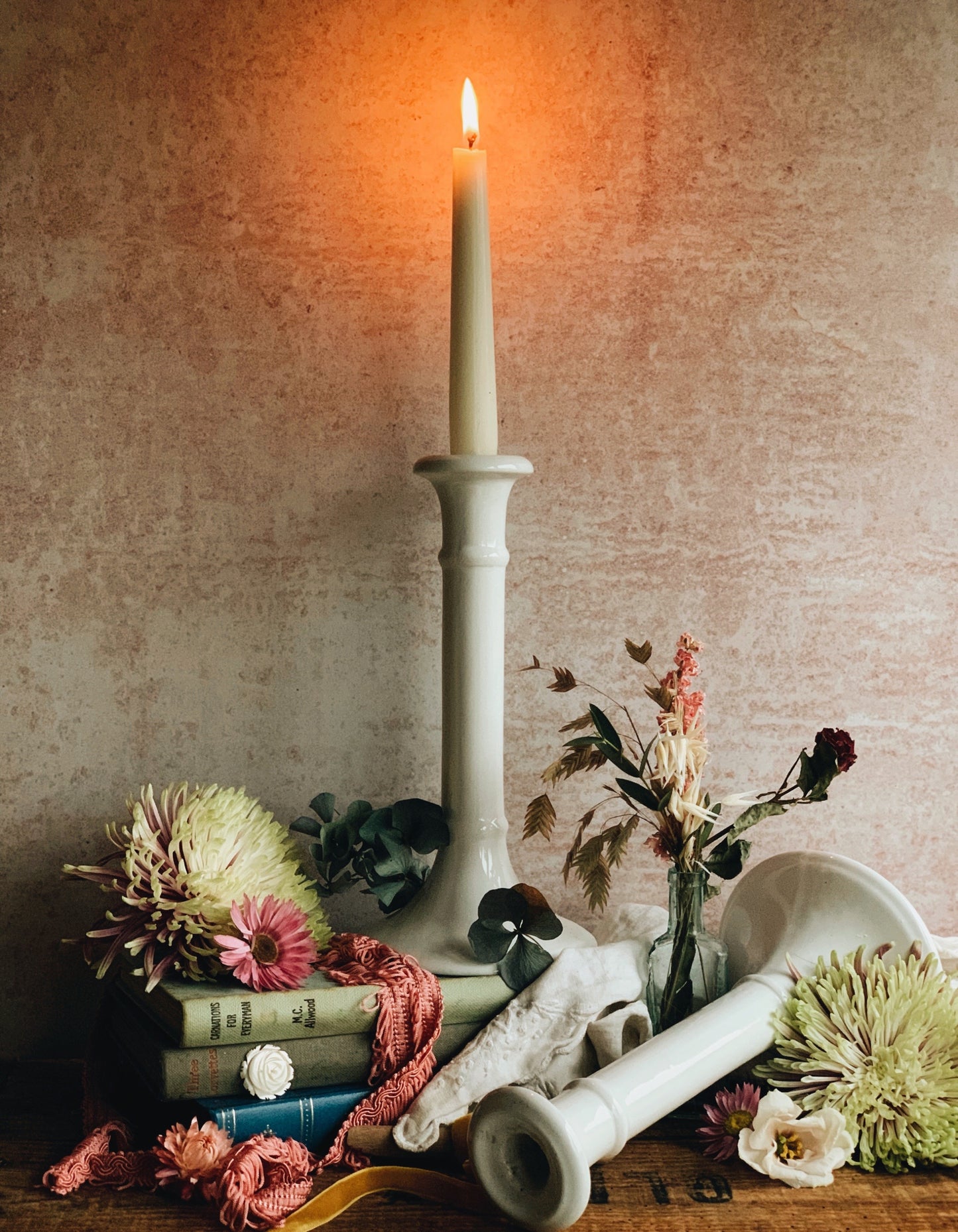 A Pair of Vintage White Ceramic Candle Sticks