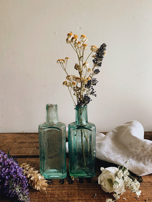 Two early 1900’s Rustic Apothecary Bottles