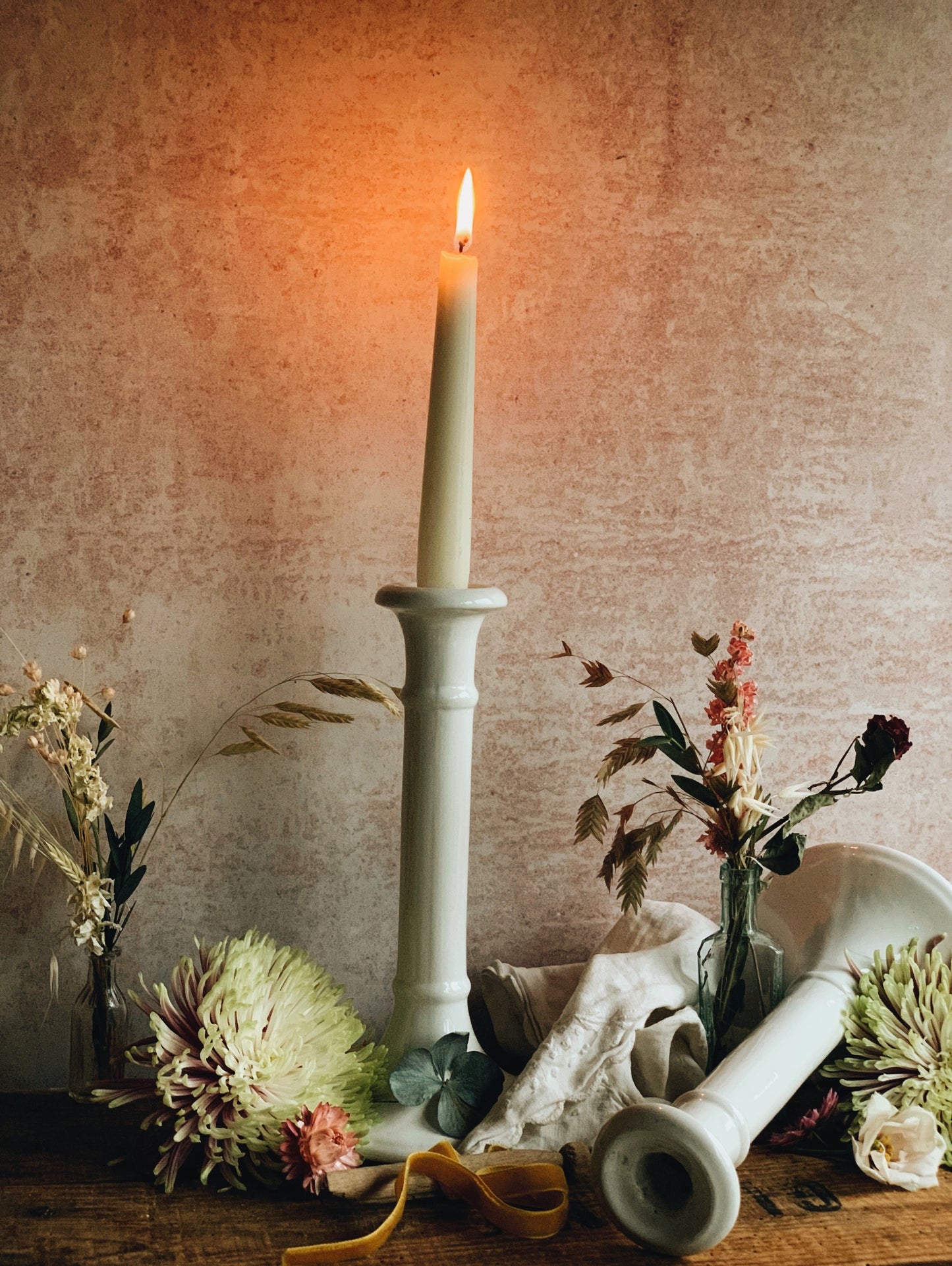 A Pair of Vintage White Ceramic Candle Sticks