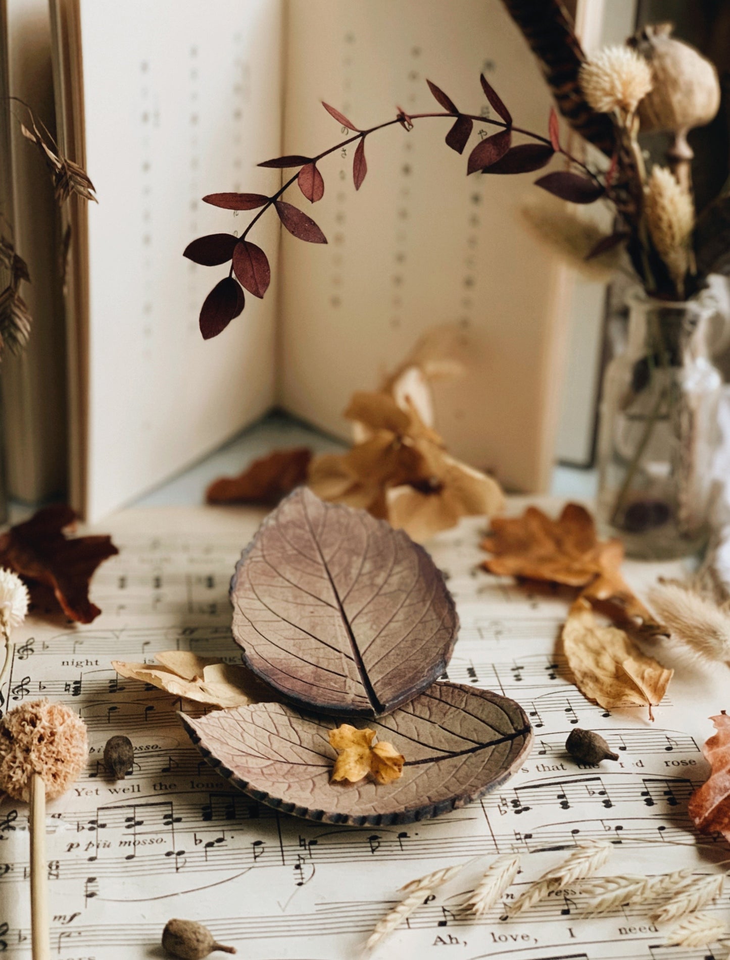 A Pair of Ceramic Leaf Print Dishes