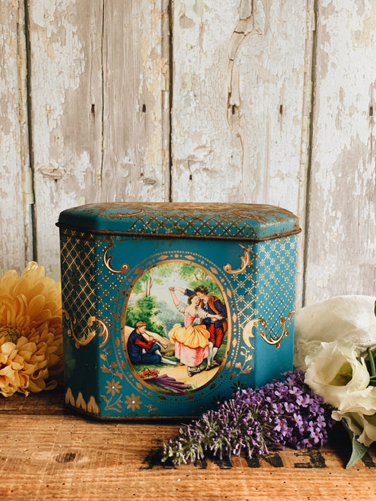 Vintage Biscuit Tin Adorned with Narrative & Decoration