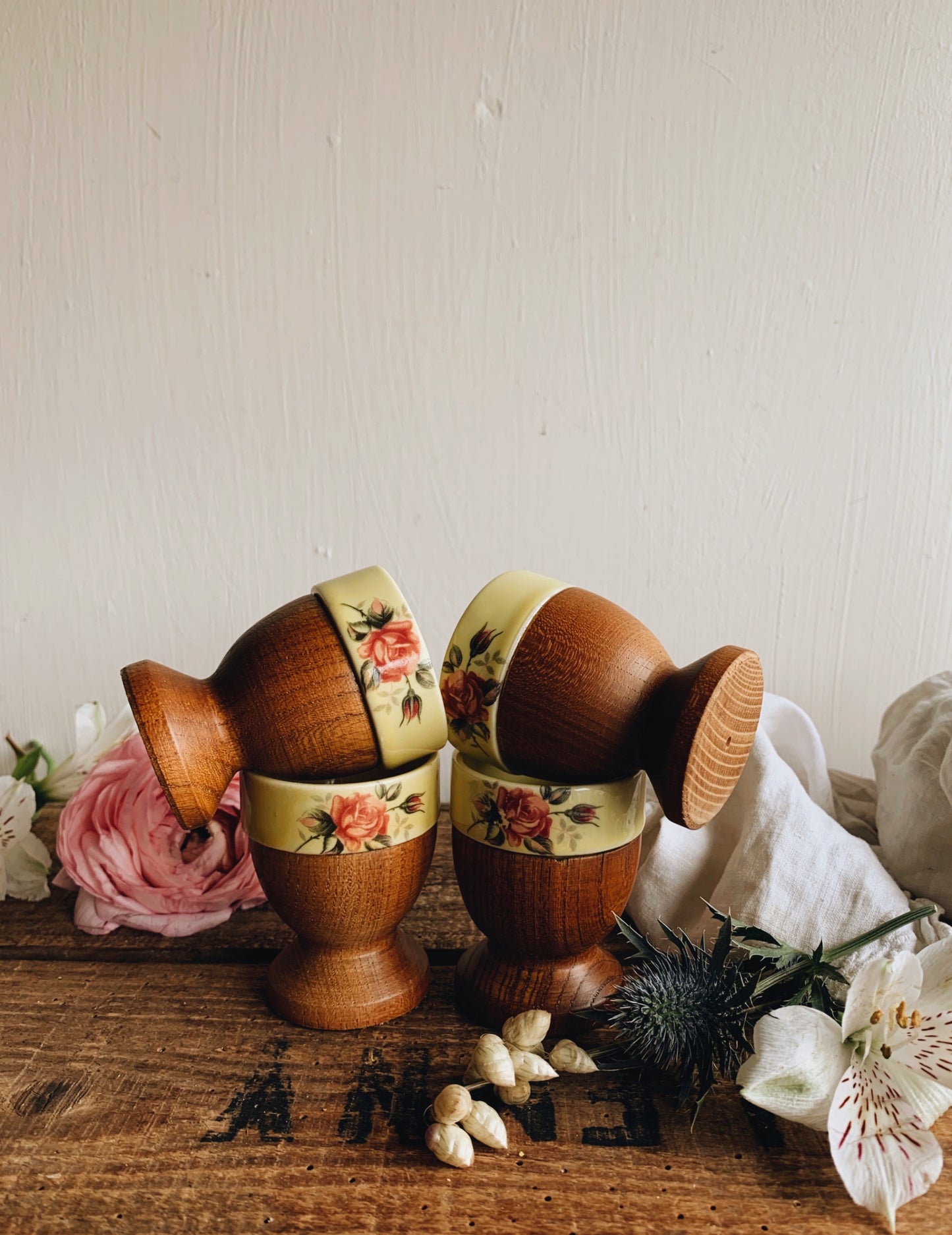 Four Vintage Wooden Egg Cups with Rose Ceramic detailing