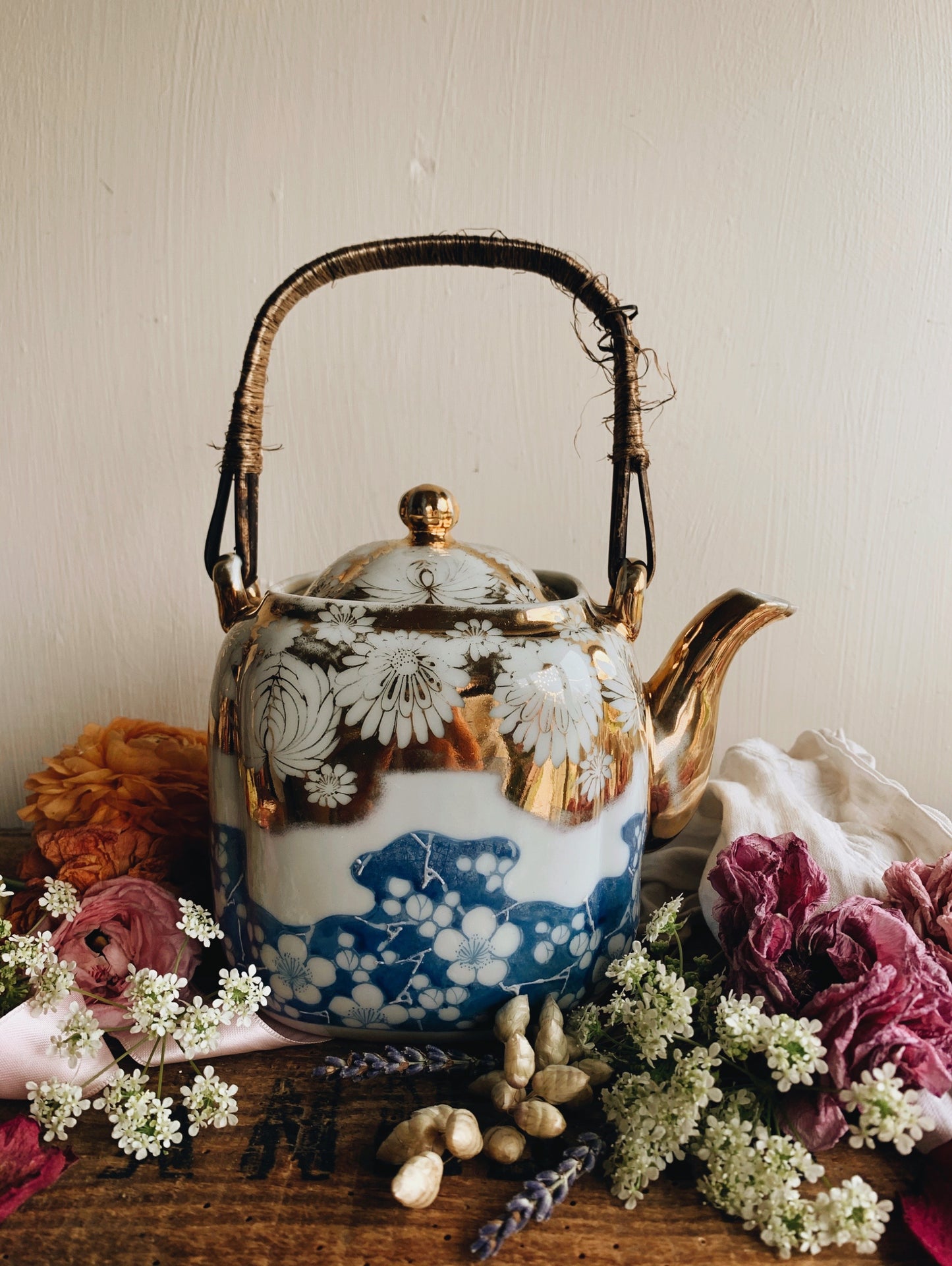 Antique Porcelain Floral Decorative Teapot with Wicker Handle